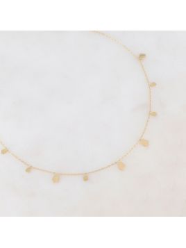 Collier doré orné de...